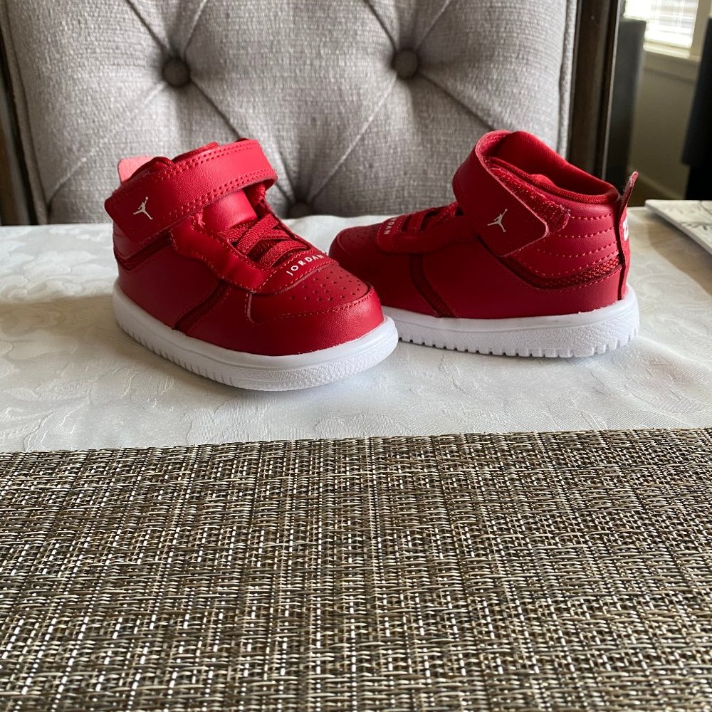 Brand new never worn Air Jordans size 5C- Red
